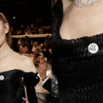 La icono pop Ariana Grande hace un gesto de rotunda solidaridad con los migrantes en la alfombra roja de los Golden Globes.